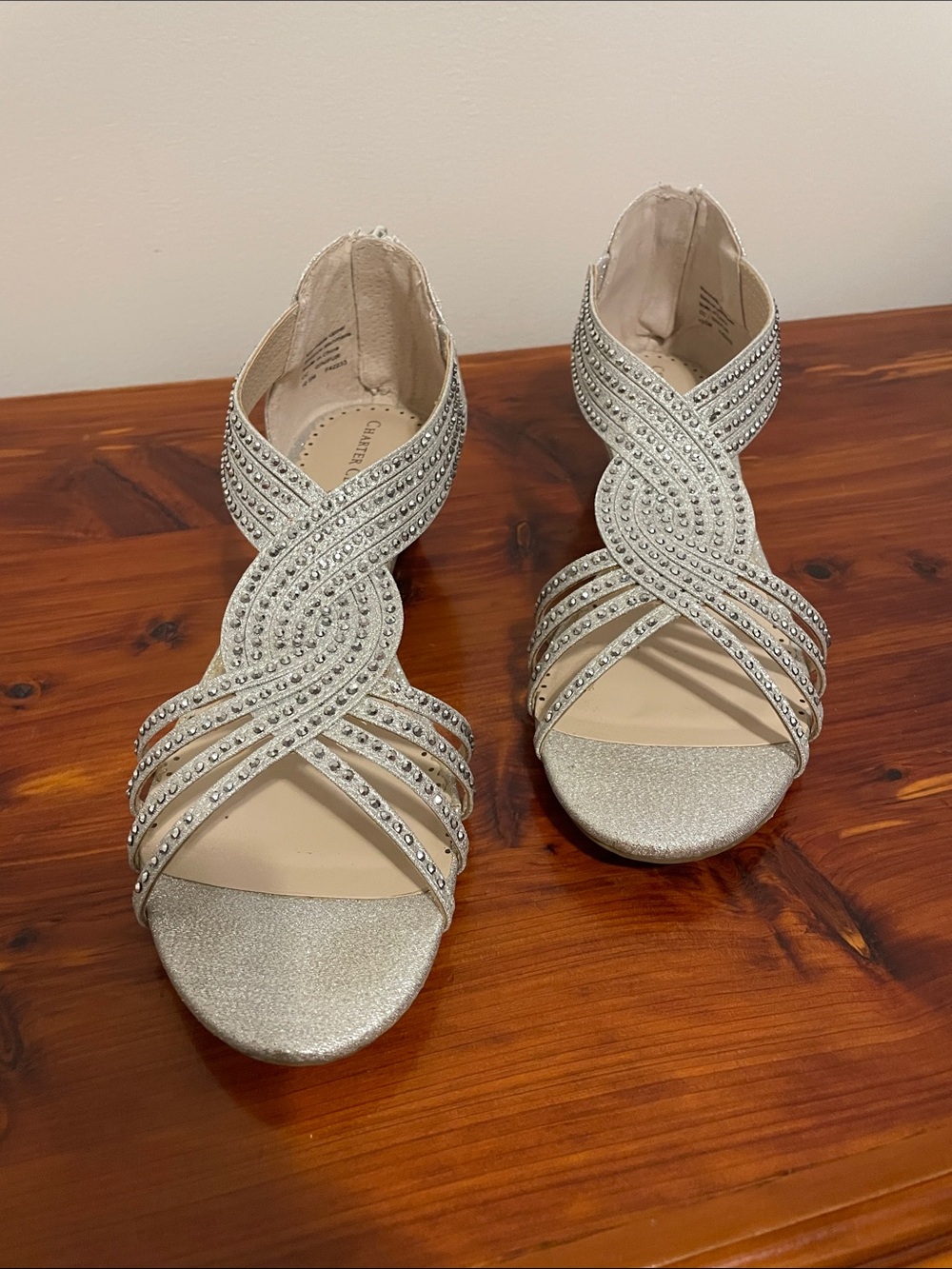 Women’s 10 1/2 m smSparkling Silver Crisscross Heeled Zippered back Sandals.